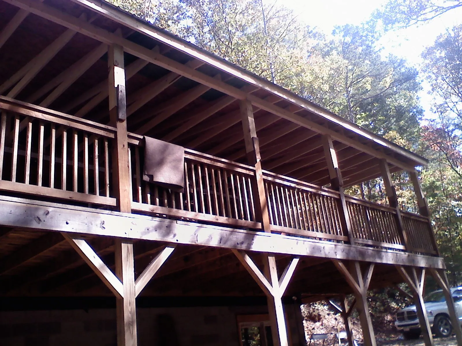 Timber framing under a new elevated porch and deck — Roof Leak Repair in Greentown by Roofing Brothers
